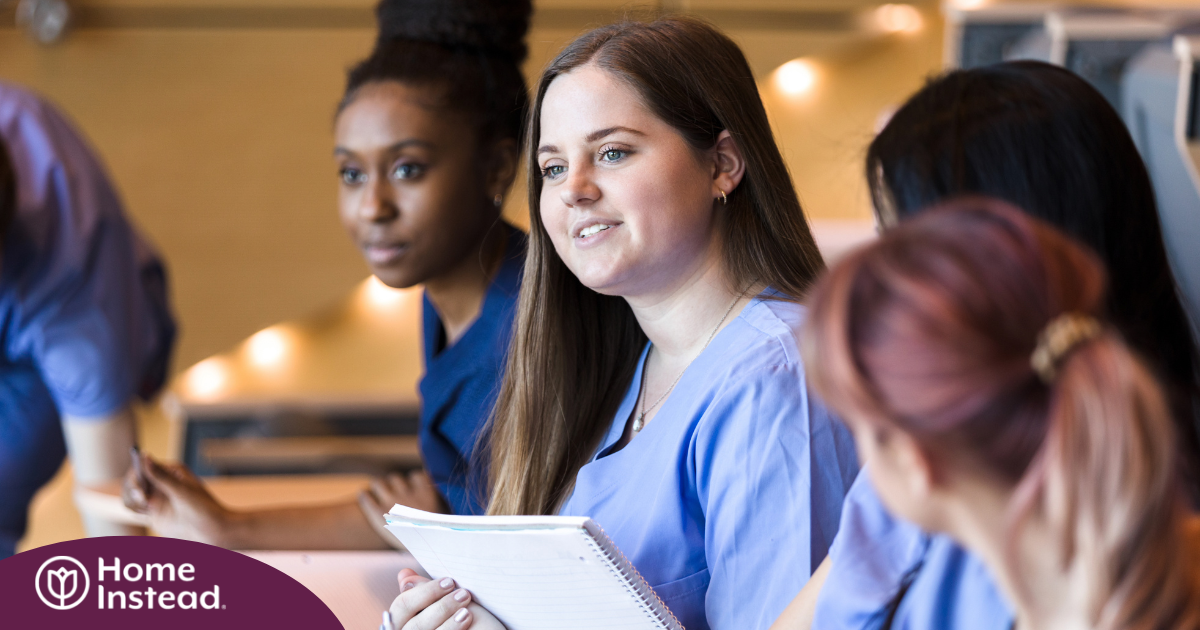 Nursing students like these may benefit from a professional caregiving job that provides experience for their chosen field.